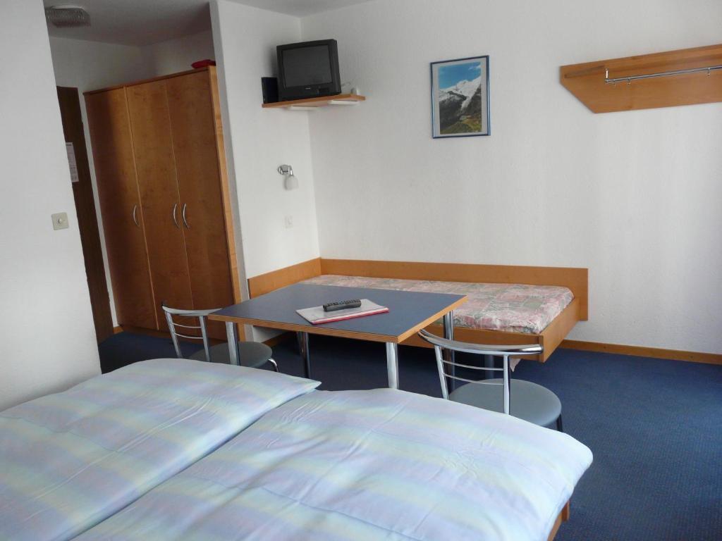 Hotel Garni Domino Saas-Fee Quarto foto